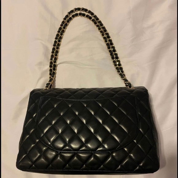 Chanel maxi flap. Retail for over $10k. Auth card and Chanel bag included - Picture 2 of 9